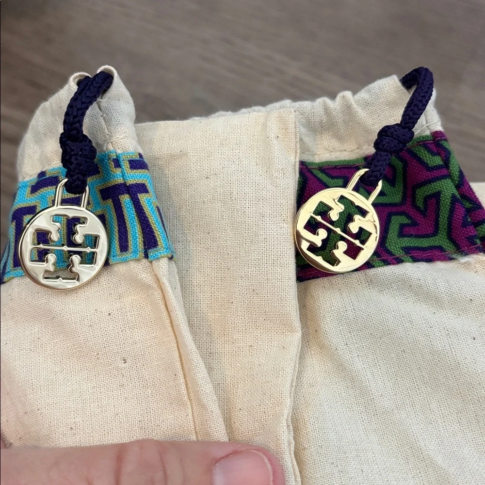 Set of 2 Tory Burch drawstring dust bags, canvas with gold charm